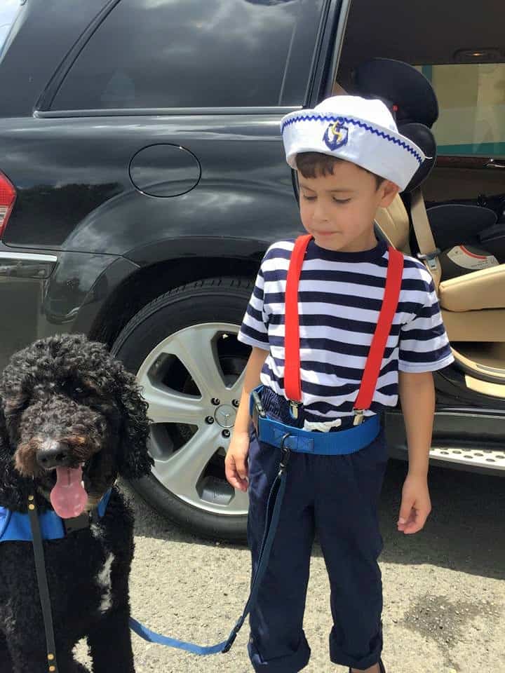 Autism Service Dog and child tethered together