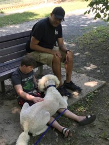 Deep pressure therapy from autism service dog